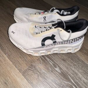 On Running Black and White Athletic Shoes